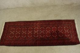 A Moghan runner. H.190 W.71cm.