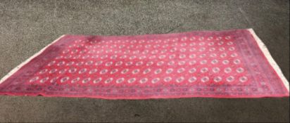 Carpet, large woollen Bokhara. L.360 W.274cm.