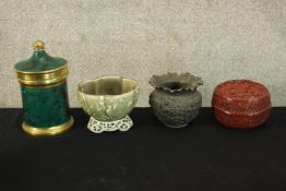 Four decorative pots. Three porcelain and one pewter. Included a Chinese Cinnabar lacquer box. H. 20