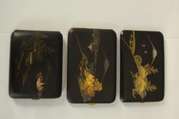 Three 19th century Japanese damascene cigarette cases with various landscape designs, mount Fuji