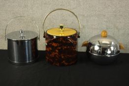 Three vintage ice buckets. One decorated with Penguins. H.34cm (largest).