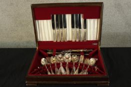 An incomplete case of Harrods silver plate cutlery. Marked Harrods on the handles. In a 'Flexfit'