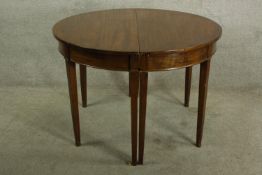 Dining table, Georgian mahogany with two extra leaves and fittings. H.70 W.212cm (ext)
