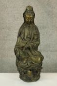 A large Chinese brass figure of Guanyin the Goddess associated with compassion. Probably early