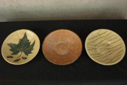 Art pottery, three stoneware bowls. Dia.34cm (each).