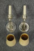 A pair of silver coloured wall lights with matching shades. H.30 x W.12 cm.