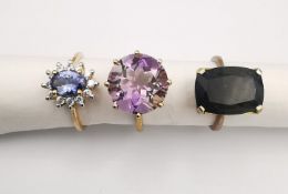 Three 20th century 9 carat gold gem-set rings with certificates. An ametrine cocktail ring, a
