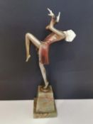 After Josef Lorenzl (Austrian, 1892-1950), an Art Deco painted bronze and ivory sculpture of