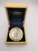 A boxed Theo Fennell bespoke made 18ct yellow gold silver ancient Greek coin brooch. The brooch is