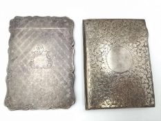 Two silver card cases. One a foliate engraved pocket dance card holder with nine carat gold pencil
