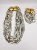 A French Premier Etage vintage statement multi snake chain necklace and bracelet. Fastens with