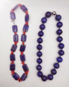 Two statement Lapis lazuli knotted necklaces, a large round bead necklace with intense colour and