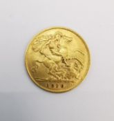 An Edward VII 1910 half sovereign, DS below the neck.