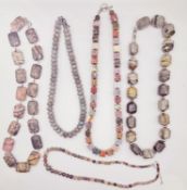 Five knotted grey and pink hard stone bead necklaces, including a statement Rhodonite bead necklace,