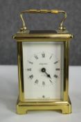 A late 20th century Brass carriage clock. Made by Baynard. With an exposed working mechanism. 14