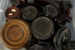 A collection of over thirty Oriental wooden display stands and plate stands. The largest with a