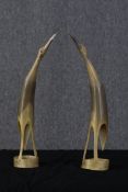 To horns or maybe tusks carved into birds. One with a damaged beak. Each measure H.40 x W.10 x D.