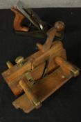 A collection of tools to include a guillotine and spoke shaves. The largest measures L. 36 cm.