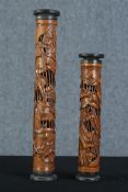 Two carved bamboo stands or maybe plinths with intricately carved lotus leaves, flowers and frogs.