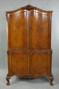 Drinks cabinet, mid century burr walnut with maple veneered interior and mirrored pull out mixing