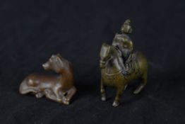 Miniature Chinese bronze figures. Early twentieth century. H.7 W.6 D.3 cm.