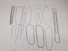 A collection of fifteen silver chain necklaces and bracelets of various designs and lengths. All