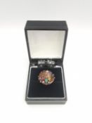 A yellow metal (tests as 9ct) gem set Indian dress ring, set with rubies, emerald, Citrine,