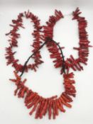 Two strings of red branch coral pieces along with a branch coral necklace. L.44cm