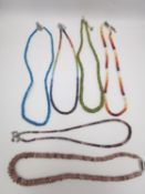 Six 20th century graduated faceted gemstone bead necklaces, some with silver clasps. Gemstones