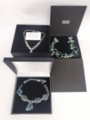 Three boxed silver statement necklaces, one set with turquoise nuggets and agate beads, a