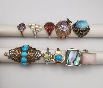 A collection of ten silver and gold plated silver dress rings some set with gemstones, including,