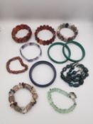 Eight gemstone bead bracelets, four with certificates. Two carnelian bracelets, two malachite