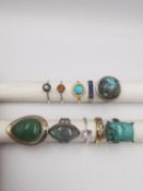 A collection of ten silver and gold plated silver dress rings some set with gemstones, including