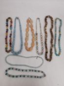 Eight 20th century gemstone bead necklaces with silver clasps, including aquamarine, dyed quartz,