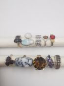 A collection of ten silver and gold plated silver dress rings with certificates. All set with