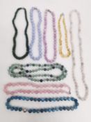 Eight 20th century gemstone bead necklaces with silver clasps, including Fluorite, Citrine, rose