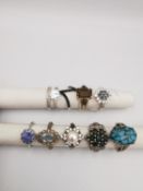 A collection of ten silver and gold plated silver dress rings some set with gemstones, including