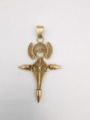 A yellow metal (tests as 14ct) Agadez filigree wirework Southern cross pedant. L.6.2 cm. Weight 9.