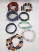 Eight gemstone bead bracelets, four with certificates. A large statement sodalite bracelet, a