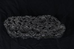 Carved hardwood. Chinese, a stand or plinth and probably early twentieth century. H.4 W.22 D.8 cm.