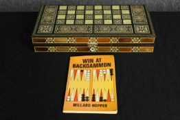A mid century Syrian Chess and Backgammon board highly decorated with with mother of pearl mosaic