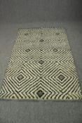 Indian Moroccan Berber design, hand made woollen, allover geometric weave. L.185 W.120cm.