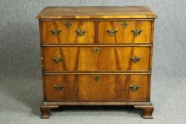 Chest of drawers, 18th century quarter veneered figured walnut on ogee bracket feet. H.83 W.89 D.