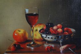 Oil on canvas. Still life with fruit and wine. Signed lower right. Framed. H.38 W.46 cm.