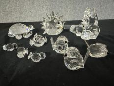 Ten boxed Swarovski Silver Crystal animals, including, a hippo, an elephant and a tortoise. Makers