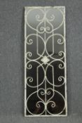 A wrought metal framed pier mirror. H.128 W.48cm.