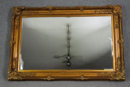 Wall mirror, large gilt floral frame. H.130 W.185cm.