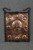 An Arts and Crafts copper and wrought iron hanging panel. H.67 W.54cm.