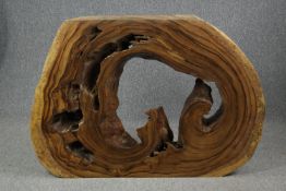 A console table cut from a section of exotic hardwood. Oiled and waxed, unique. H.107 W.140 D.20cm.