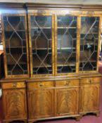 Library bookcase, Georgian style flame mahogany, in two main sections. H.228 W.183 D.39cm.